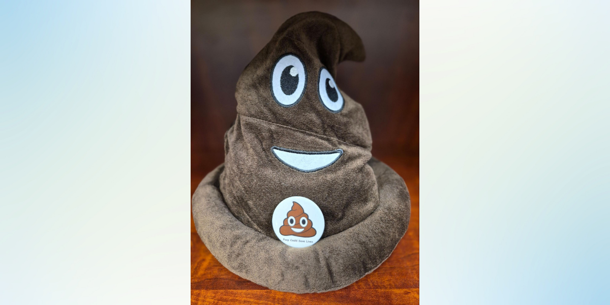 Picture of a poop emoji hat and button.